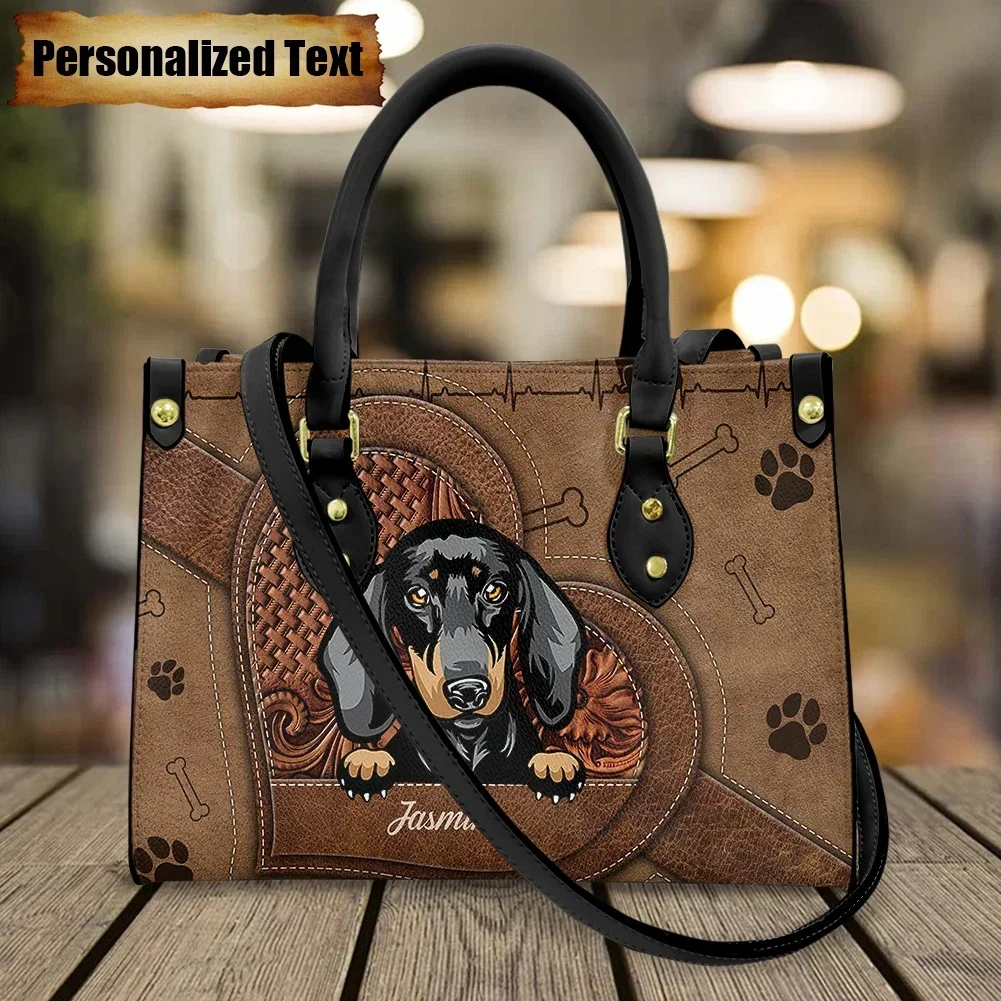 Luxury Bags Brand Names - กระเป๋าสะพายหนังสำหรับผู้หญิง ปักชื่อได้ ลายสุนัขดัชชุนด์น่ารัก กระเป๋าถือลำลอง ดีไซน์แบรนด์หรูหรา